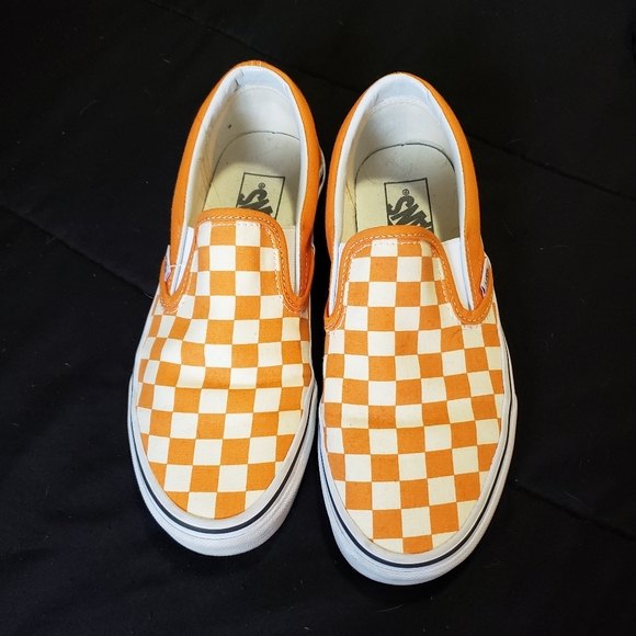 orange checkered slip on vans